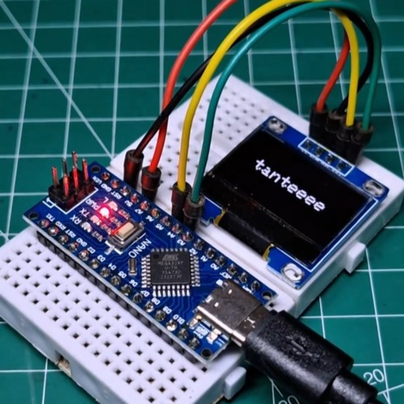 Highlight image for 🎶Arduino Musik Display menampilkan lirik lagu "Sudah Terbiasa Terjadi Tante" di layar OLED 128x64 I2C.